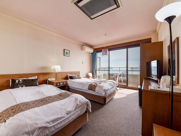 Imagen de la habitación del Hotel Komogakushi Onsen Sanyo Club. Foto 19