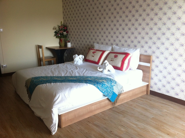 Imagen de la habitación del Hotel Komol Residence Bangkok. Foto 6