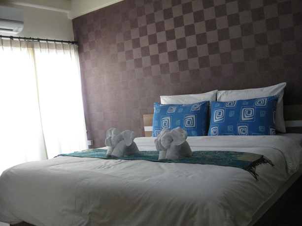 Imagen de la habitación del Hotel Komol Residence Bangkok. Foto 10