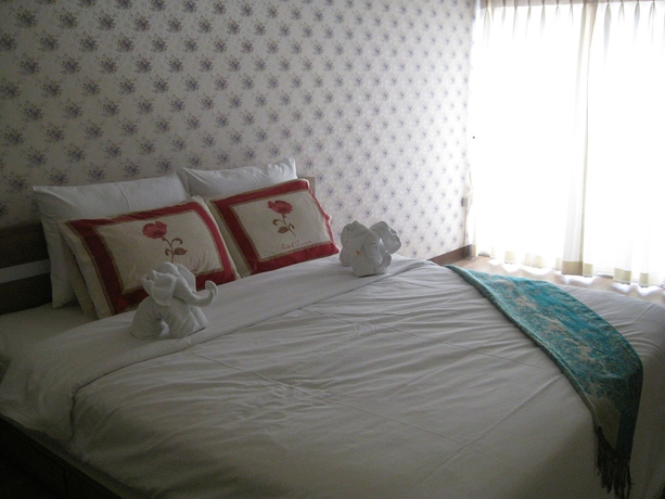 Imagen de la habitación del Hotel Komol Residence Bangkok. Foto 11