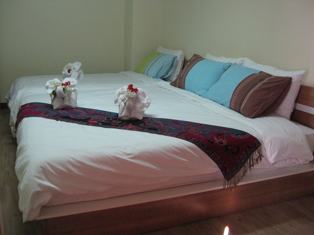 Imagen de la habitación del Hotel Komol Residence Bangkok. Foto 13