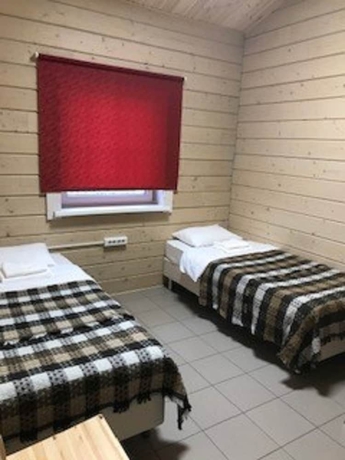 Imagen de la habitación del Hotel Kompleks Gostevyye Doma Barents. Foto 5