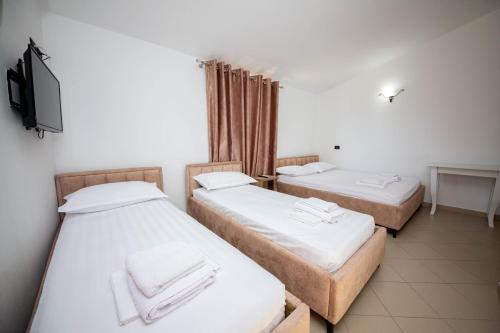 Imagen de la habitación del Hotel Kompleksi Dea. Foto 16