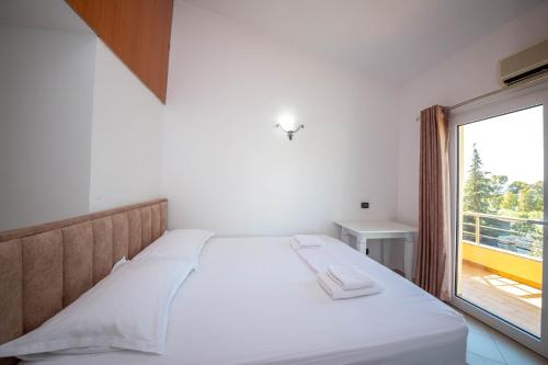 Imagen de la habitación del Hotel Kompleksi Dea. Foto 17
