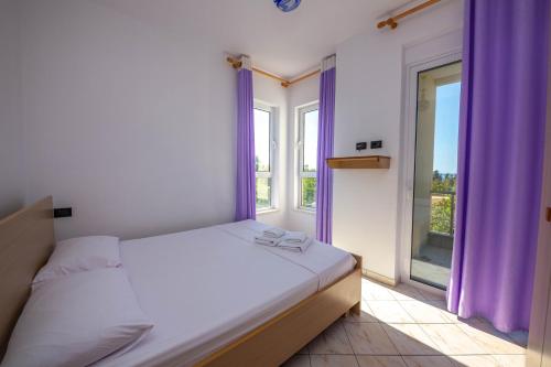 Imagen de la habitación del Hotel Kompleksi Dea. Foto 18