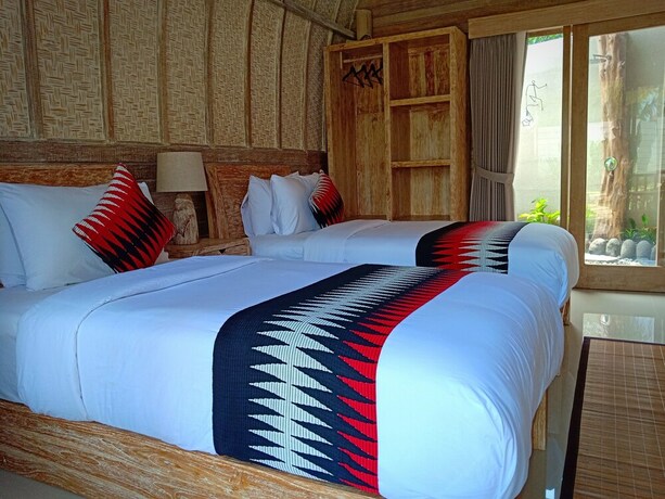 Imagen de la habitación del Hotel Kompyang Cottage. Foto 17