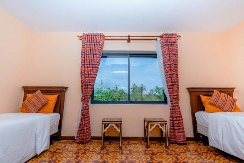 Imagen de la habitación del Hotel Komsan Kampot Resort By EHM. Foto 11