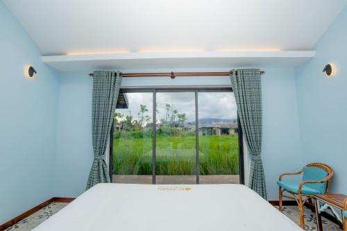 Imagen de la habitación del Hotel Komsan Kampot Resort By EHM. Foto 17