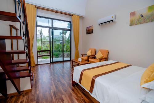 Imagen de la habitación del Hotel Komsan Kampot Resort By EHM. Foto 19