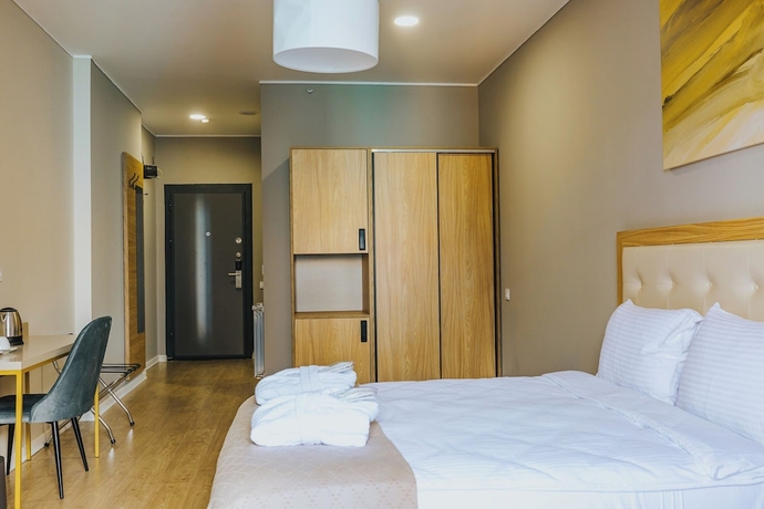 Imagen de la habitación del Hotel Komunna Luxe. Foto 6