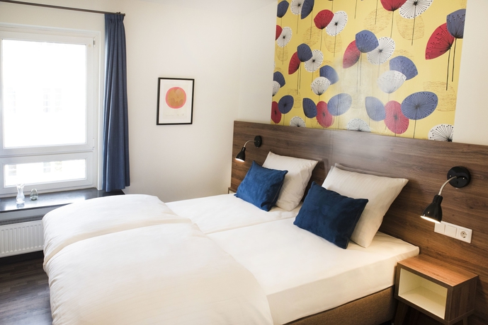 Imagen de la habitación del Hotel Koncept Zum Kostbaren Blut. Foto 14