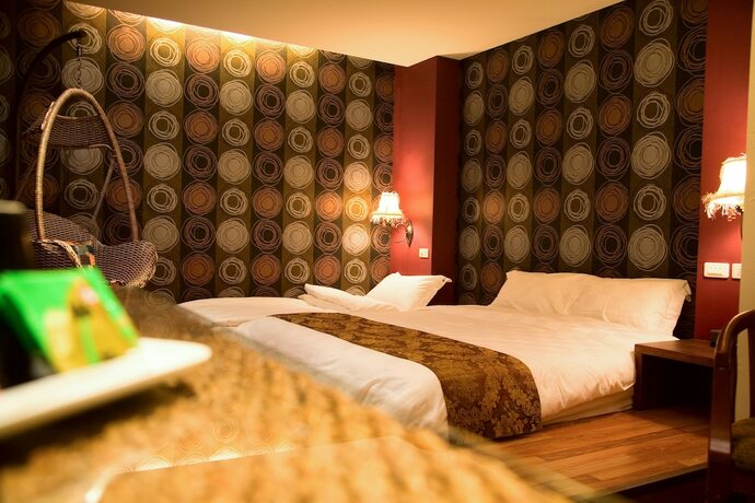 Imagen de la habitación del Hotel K-one Homestay. Foto 12