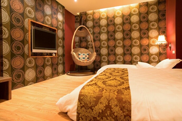 Imagen de la habitación del Hotel K-one Homestay. Foto 19