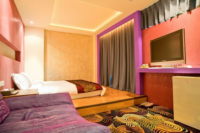 Imagen de la habitación del Hotel K-one Homestay. Foto 21