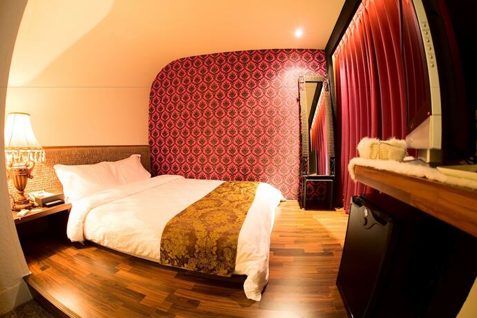 Imagen de la habitación del Hotel K-one Homestay. Foto 23