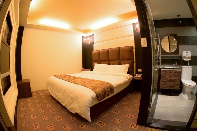 Imagen de la habitación del Hotel K-one Homestay. Foto 29