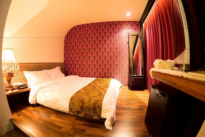 Imagen de la habitación del Hotel K-one Homestay. Foto 32