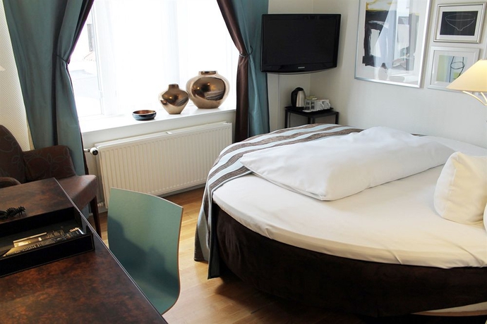 Imagen de la habitación del Hotel Kong Arthur. Foto 7