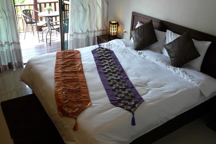 Imagen de la habitación del Hotel Kong Garden View Resort. Foto 11