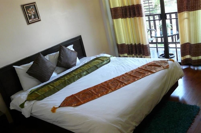 Imagen de la habitación del Hotel Kong Garden View Resort. Foto 13