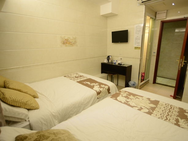 Imagen de la habitación del Hotel Kong Hing Guest House. Foto 3