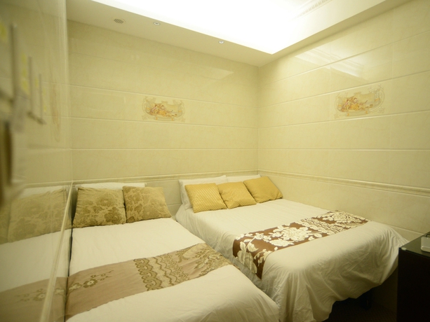 Imagen de la habitación del Hotel Kong Hing Guest House. Foto 4