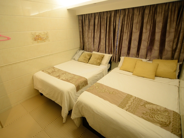 Imagen de la habitación del Hotel Kong Hing Guest House. Foto 14