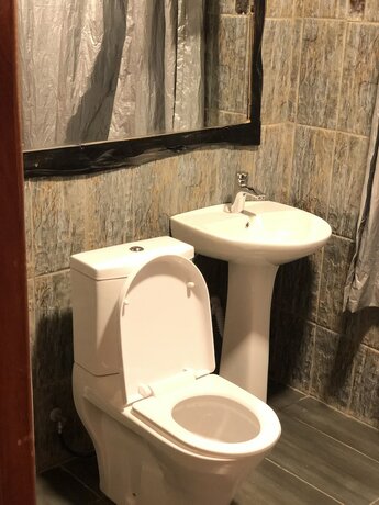 Imagen de la habitación del Hotel Konga Kigali. Foto 8