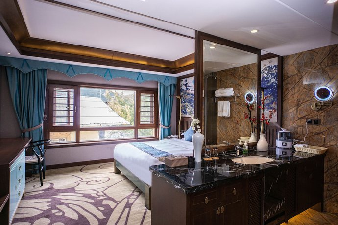 Imagen de la habitación del Hotel Konggu Youlan. Foto 8