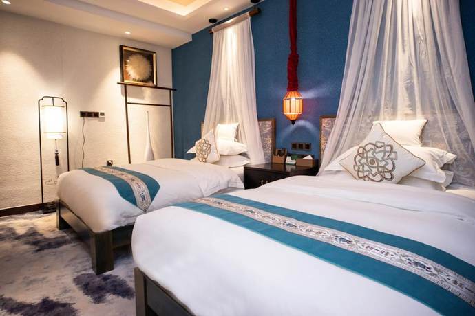 Imagen de la habitación del Hotel Konggu Youlan. Foto 12