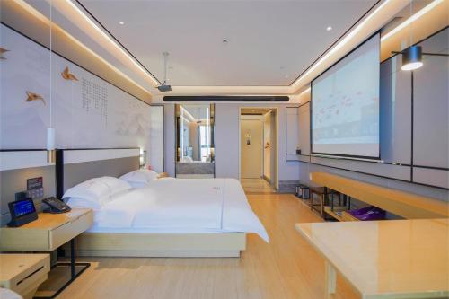 Imagen de la habitación del Hotel Konggu Youlan Ningbo Yuyao North Xinjian Road. Foto 15