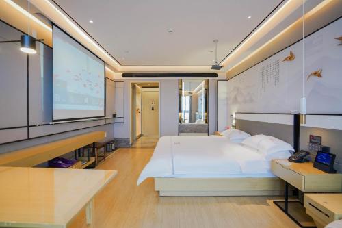 Imagen de la habitación del Hotel Konggu Youlan Ningbo Yuyao North Xinjian Road. Foto 16