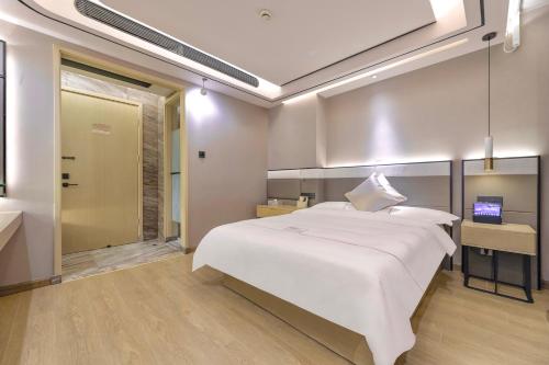 Imagen de la habitación del Hotel Konggu Youlan Ningbo Yuyao North Xinjian Road. Foto 17