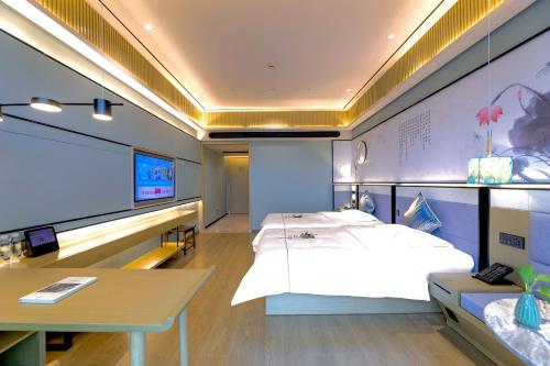 Imagen de la habitación del Hotel Konggu Youlan Ningbo Yuyao North Xinjian Road. Foto 18