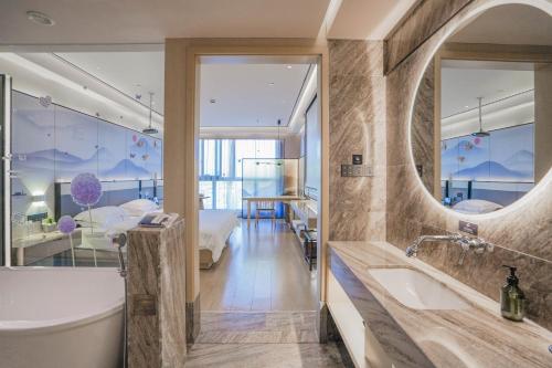 Imagen de la habitación del Hotel Konggu Youlan Ningbo Yuyao North Xinjian Road. Foto 19