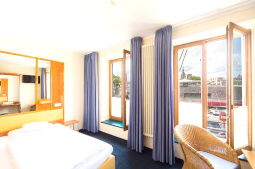 Imagen de la habitación del Hotel Kontorhaus Stralsund. Foto 6