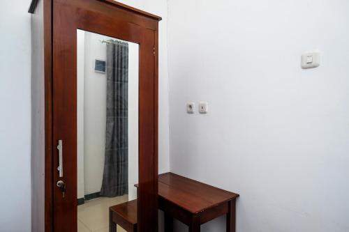 Imagen de la habitación del Hotel KoolKost Syariah near Kawasan Industri Candi Semarang 2. Foto 20