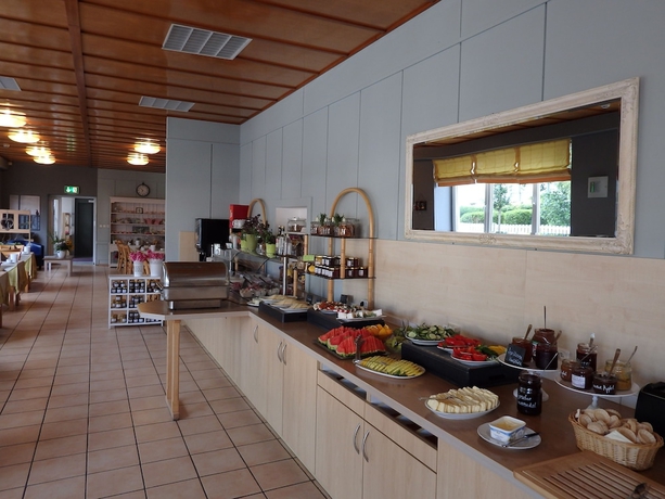 Imagen del bar/restaurante del Hotel Koopmanns Hotel und Lädchen. Foto 2