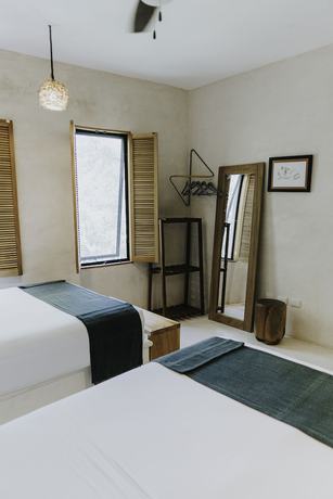 Imagen de la habitación del Hotel Koos Boutique Tulum. Foto 5