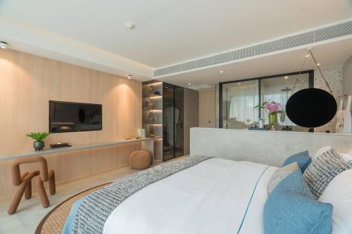 Imagen de la habitación del Hotel Kora Beach Resort Phuket. Foto 12