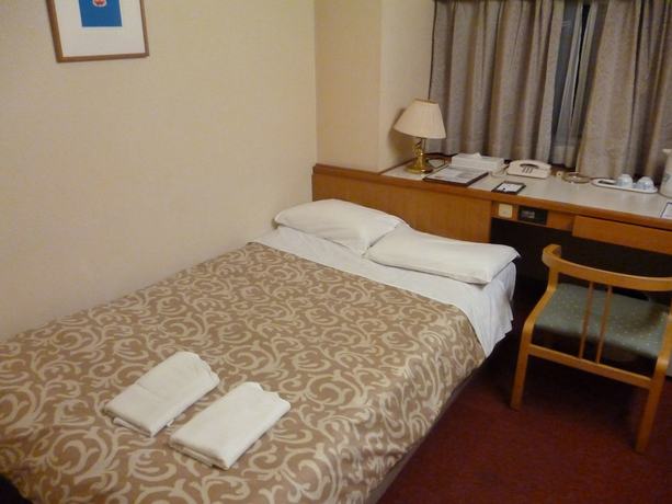 Imagen de la habitación del Hotel Koraku Garden. Foto 12