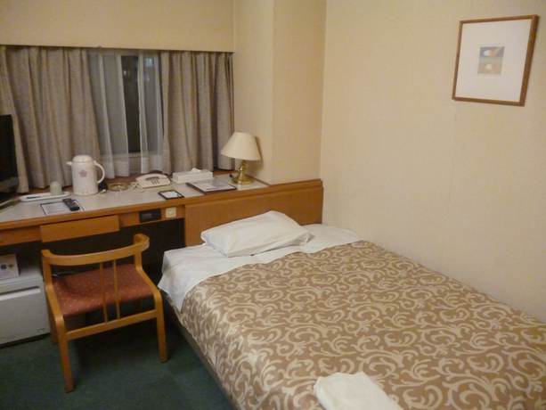 Imagen de la habitación del Hotel Koraku Garden. Foto 15