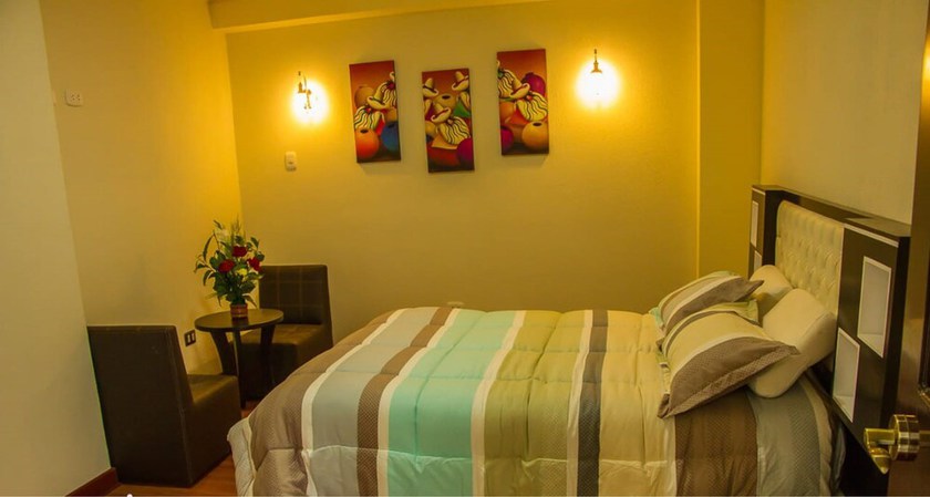 Imagen de la habitación del Hotel Korimarka Suite. Foto 10