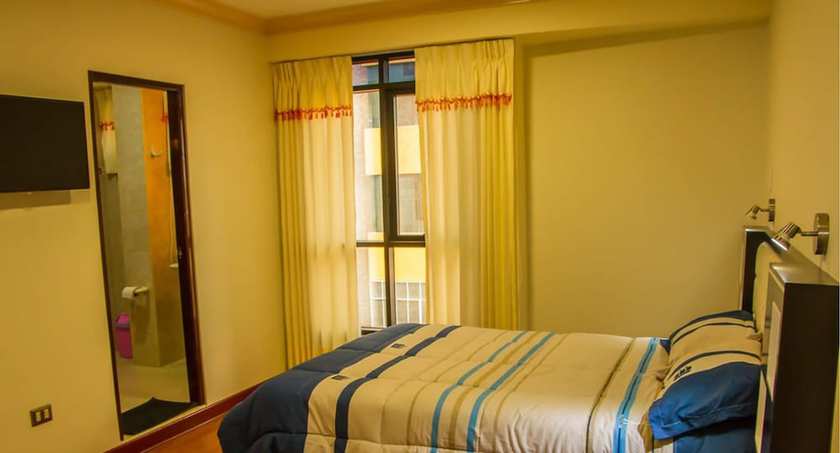 Imagen de la habitación del Hotel Korimarka Suite. Foto 17