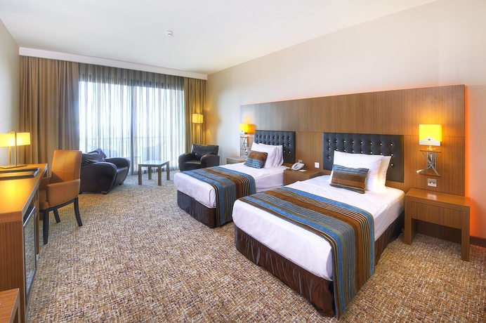 Imagen de la habitación del Hotel Korineum Golf and Beach Resort. Foto 12