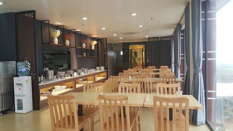 Imagen del bar/restaurante del Hotel Korinn Pho Yen Hotel. Foto 11