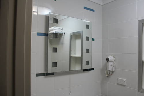 Imagen de la habitación del Hotel Korora Bay Village Resort. Foto 6