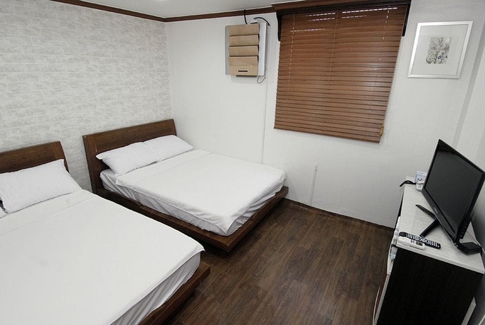 Imagen de la habitación del Hotel Korstay Guest House. Foto 11