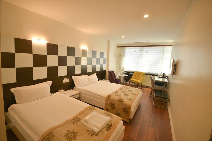 Imagen de la habitación del Hotel Kosk Otel. Foto 11