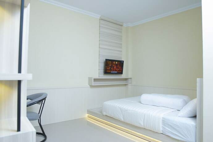 Imagen de la habitación del Hotel Kost Eksklusif Teduh. Foto 17